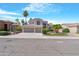 Beautiful desert home with manicured landscaping, a tile roof, and an expansive driveway at 641 W Oriole Way, Chandler, AZ 85286