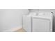 Laundry room with a white washer and dryer at 641 W Oriole Way, Chandler, AZ 85286