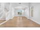 Spacious living room featuring hardwood floors, an arched entryway, and lots of natural light at 641 W Oriole Way, Chandler, AZ 85286