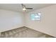 Bright bedroom featuring a ceiling fan and window providing ample natural light at 803 W 18Th St, Tempe, AZ 85281
