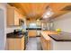 Well-lit kitchen features a spacious island, stainless steel appliances, and sleek countertops at 803 W 18Th St, Tempe, AZ 85281