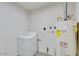 Functional laundry area with washer, dryer, and water heater for added convenience at 803 W 18Th St, Tempe, AZ 85281