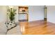 Open living room with hardwood floors, leading to a kitchen with modern appliances at 803 W 18Th St, Tempe, AZ 85281