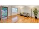 Open living room with hardwood floors, large window, and neutral color palette at 803 W 18Th St, Tempe, AZ 85281