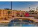 Sparkling pool with tile accents and decorative planters create a serene and inviting outdoor space at 803 W 18Th St, Tempe, AZ 85281