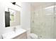 Bathroom boasting a glass shower, modern vanity, and contemporary finishes at 8934 E Rusty Spur Pl, Scottsdale, AZ 85255
