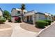 Exterior of the home with neutral tones, desert landscaping, and well-maintained surroundings at 9047 N 52Nd Ave, Glendale, AZ 85302