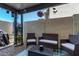Private patio featuring stylish furniture and decor, creating a tranquil outdoor space at 9047 N 52Nd Ave, Glendale, AZ 85302