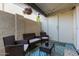 Cozy patio seating area featuring neutral cushions, perfect for relaxing outdoors at 9047 N 52Nd Ave, Glendale, AZ 85302