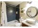 Stylish bathroom with navy subway tile, marble countertop, and trendy vessel sink for a modern feel at 9280 E Davenport Dr, Scottsdale, AZ 85260