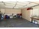 Spacious garage featuring lots of storage cabinets, ideal for organizing tools and equipment at 9280 E Davenport Dr, Scottsdale, AZ 85260