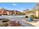 Community pool area, perfect for relaxation with lounge chairs and desert landscaping at 9280 E Davenport Dr, Scottsdale, AZ 85260