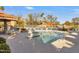 Community pool and lounge chairs with desert landscaping for a relaxing retreat at 9280 E Davenport Dr, Scottsdale, AZ 85260