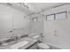 Updated bathroom with granite counters, a shower/tub combo, and modern fixtures at 9631 E Palm Ridge Dr, Scottsdale, AZ 85260