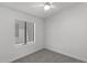 Bedroom featuring carpet flooring, a ceiling fan, a window, and neutral walls at 9631 E Palm Ridge Dr, Scottsdale, AZ 85260