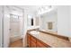 Bathroom with a granite-style countertop, ample storage, and a shower/tub combo at , Mesa, AZ 85201