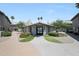 Community clubhouse with well-maintained landscaping and double door entrance at , Mesa, AZ 85201