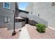 Inviting condo entrance with walkway, private patio and desert-style rock landscaping at , Mesa, AZ 85201