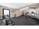 Bright community gym area with a variety of equipment including weights and machines at , Mesa, AZ 85201