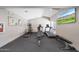 Bright community gym area with a variety of equipment including weights and machines at , Mesa, AZ 85201