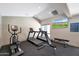 Community gym area featuring updated equipment and signage at , Mesa, AZ 85201