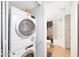 Bathroom laundry space features stacked washer and dryer units and extra storage at , Mesa, AZ 85201
