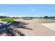 Scenic park view featuring green spaces, landscaping, a water feature, and walking paths at , Mesa, AZ 85201