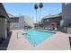 Community pool area, with lounge chairs and palm trees at , Mesa, AZ 85201