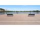 Beautiful waterfront area with benches and palm trees, perfect for relaxing and enjoying the scenic views at , Mesa, AZ 85201