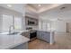 Modern kitchen with stainless steel appliances, white countertops and breakfast bar at 101 N 7Th St # 168, Phoenix, AZ 85034