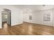 Bright living room with hardwood floors and lots of natural light at 10212 E Caballero St, Mesa, AZ 85207