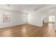 Bright living room with hardwood floors, white walls, and lots of natural light at 10212 E Caballero St, Mesa, AZ 85207