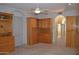Spacious main bedroom with custom built-in cabinets and access to en-suite bath at 11290 N 117Th St, Scottsdale, AZ 85259