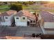 Aerial view of home featuring a two-car garage and well-maintained landscaping at 1212 S Boulder St # C, Gilbert, AZ 85296