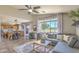 Open concept living room boasts modern finishes, lots of light, and a view of the kitchen at 1212 S Boulder St # C, Gilbert, AZ 85296