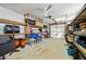 Spacious garage with shelving, storage, and ample room for parking or hobbies at 14830 N 28Th Pl, Phoenix, AZ 85032