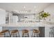 Bright kitchen featuring granite countertops, stainless appliances, and a breakfast bar at 14830 N 28Th Pl, Phoenix, AZ 85032