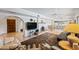 Expansive living area showcasing an open layout connecting the kitchen, dining, and seating spaces at 14830 N 28Th Pl, Phoenix, AZ 85032