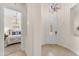 Bright entryway with tile flooring and a view into the primary bedroom at 1771 E Alegria Rd, Queen Creek, AZ 85140
