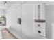 Garage interior showcases an Aurora solar inverter and a water heater against a clean, white wall at 1771 E Alegria Rd, Queen Creek, AZ 85140