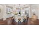 Gourmet kitchen featuring a large center island, custom cabinets, and stainless steel appliances at 1771 E Alegria Rd, Queen Creek, AZ 85140