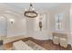 Sophisticated living room with wood floors, stylish decor, and lots of natural light at 1771 E Alegria Rd, Queen Creek, AZ 85140