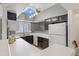 Bright kitchen with ample counter space, dark cabinets and a large window above the sink at 1800 W Elliot Rd # 240, Chandler, AZ 85224