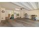 Spacious garage with ample room for parking and storage, featuring an automatic door at 1836 N 77Th Gln, Phoenix, AZ 85035