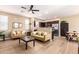 Inviting living room open to the kitchen area, perfect for entertaining and Gathering gatherings at 1836 N 77Th Gln, Phoenix, AZ 85035