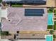Aerial view of a home featuring a tile roof, solar panels, sparkling pool, and well-maintained landscaping at 21352 E Domingo Rd, Queen Creek, AZ 85142