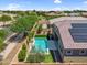 Beautiful aerial view of backyard showing pool and green grass at 21352 E Domingo Rd, Queen Creek, AZ 85142