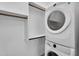 Compact laundry closet featuring an electric washer and dryer at 21352 E Domingo Rd, Queen Creek, AZ 85142