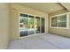 Covered patio with sliding glass doors overlooking a swimming pool at 21352 E Domingo Rd, Queen Creek, AZ 85142