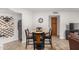 Comfortable dining area featuring a round table with four chairs and adjacent to the kitchen at 2228 N 52Nd St # 140, Phoenix, AZ 85008